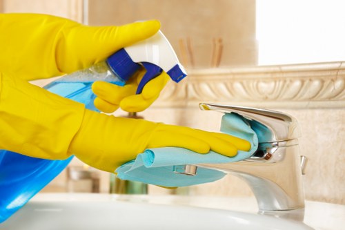 End of tenancy cleaning tasks in a Nottinghill home including cupboards and surfaces