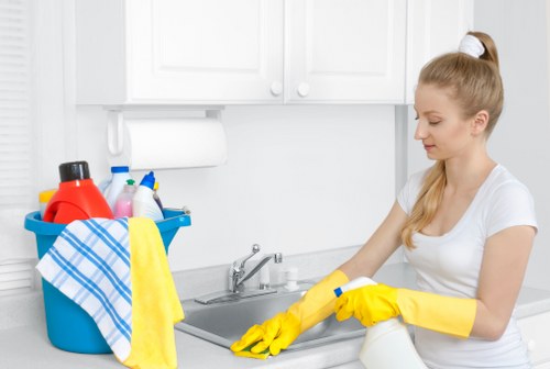 Local stain removal technician assessing fabric and upholstery